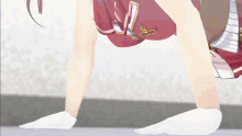 a girl in a red uniform with the number 7 on the front
