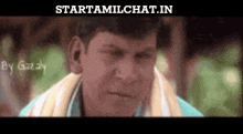 a close up of a man 's face with the words starttamilchat.in below it