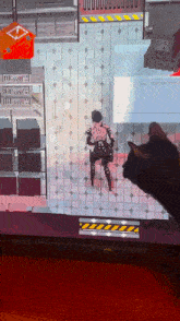 a black cat is playing a video game on a monitor that says ' playstation ' on it