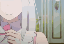 a close up of a girl 's face with white hair and a pink bow