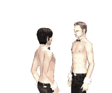a man without a shirt is standing next to another man