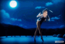 a man in a bunny suit is dancing in front of a full moon in a video made by kapwing
