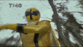 a yellow superhero with the time of 7:46