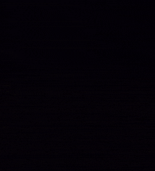 a black background with a lot of gold sparkles on it