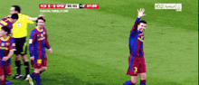 a soccer player with the number 3 on his jersey waving