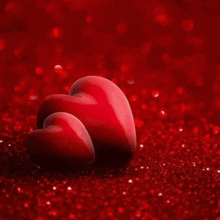 a welcome to kandy heart sign with two hearts