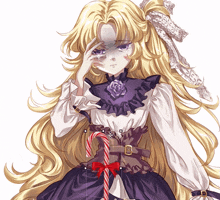 a girl with long blonde hair holds a candy cane in her hand