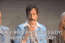 a man in a blue suit says " hey ron and chassidy ! happy arbor day "