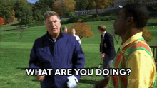 a man standing on a golf course with the words what are you doing