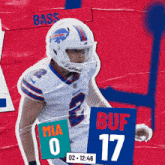 a buffalo bills football player is holding a sign with the number 17 on it
