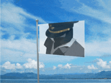 a flag with a picture of a man in a military uniform flying in the wind