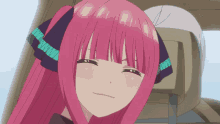 a girl with pink hair and a bow on her head