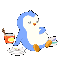 a blue and white penguin sits next to a cup of ramen