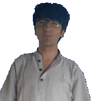a young man wearing glasses and a white shirt looks at the camera