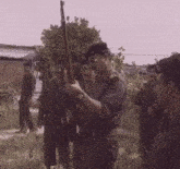 Saddam Hussein Iraq GIF - Saddam Hussein Iraq Gun GIFs