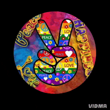 a peace sign in a colorful circle with the words peace love and love written below it