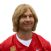 a man with blonde hair is wearing a red nike jersey with the letters sg on it