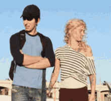 a man and a woman standing next to each other