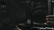 a screenshot of a video game shows a person aiming a gun