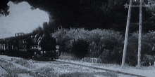 a black and white photo of a train with the words " and the battle is going again "