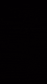 a dark background with a lot of gold sparkles