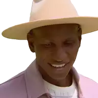 a man wearing a hat and a pink shirt smiles for the camera