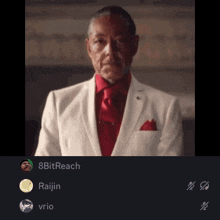a picture of a man in a white suit and red tie with 8bitreach written below him
