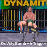 a man in a wrestling ring is carrying another man on his shoulders .