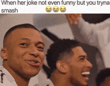 two men are laughing with a caption that reads " when her joke not even funny but you tryna smash "