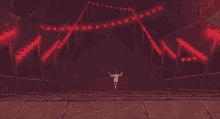 a woman is walking down a set of stairs with red lanterns .