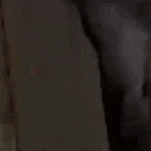 a close up of a person wearing headphones .