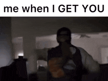 a man in a mask is holding a gun and says me when i get you .