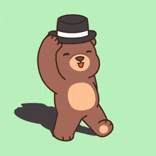 a brown teddy bear wearing a top hat