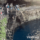 Cliff Jumping Viralhog GIF - Cliff Jumping Viralhog Jumping Together GIFs