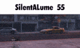 a yellow car is parked on the side of the road with the words silentalume 55 above it