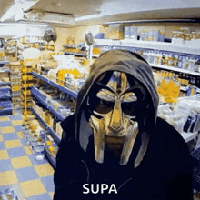 a man wearing a mask and sunglasses is in a grocery store .