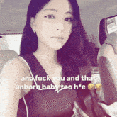a woman in a car with a caption that says " and fuck you and that unborn baby too h*e "