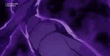 a close up of a person 's hand with purple nails on a dark background .