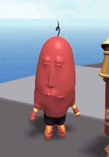 a red cartoon character with arms and legs is standing on a sidewalk