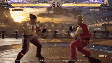 two men are fighting in a video game with the number 60 in the background