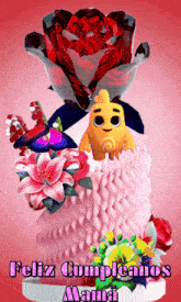 a pink cake with flowers and a cartoon character says feliz cumplanos mama