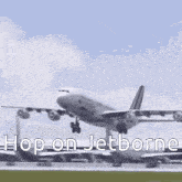 a large passenger jet is taking off from an airport runway and the words hop on jetborne are visible .