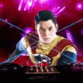 a man in a superhero costume is standing behind a mixer