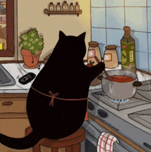 a black cat is cooking in a kitchen with a bottle of olive oil