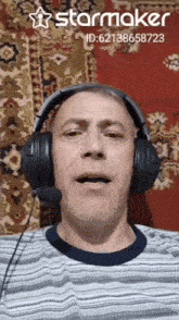 a man wearing headphones with a starmaker id displayed on the bottom
