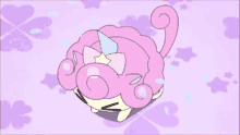 a cartoon of a girl with blonde hair and a pink unicorn on her head
