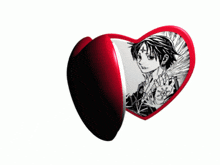 a heart shaped mirror with a picture of a girl and a man