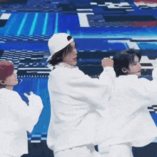 a group of people are dancing on a stage .