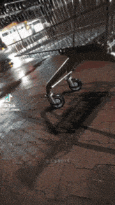 a shopping cart is sitting on a brick sidewalk with a tik tok watermark on the bottom