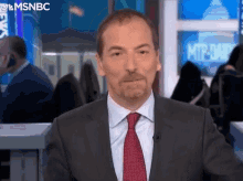 smiling happy delighted laughing chuck todd